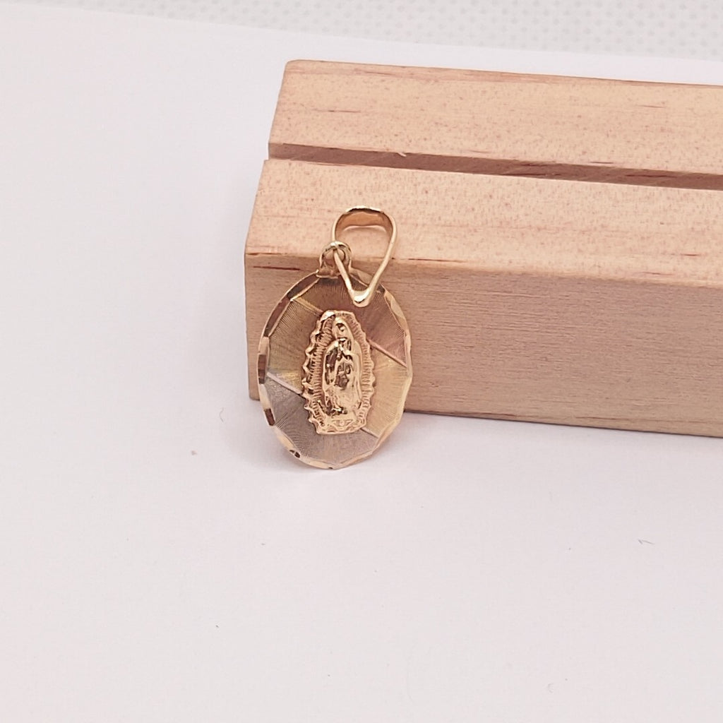 MEDALLA RELIGIOSA ORO 10 K 1.2 GRMS (SEMINUEVO)