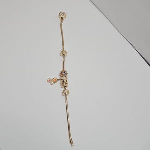 PULSERA CHARM ORO 14K 16.2 (NUEVO)