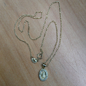 CADENA, MEDALLA RELIGIOSA ORO 10 K 1.6 GRMS (SEMINUEVO)