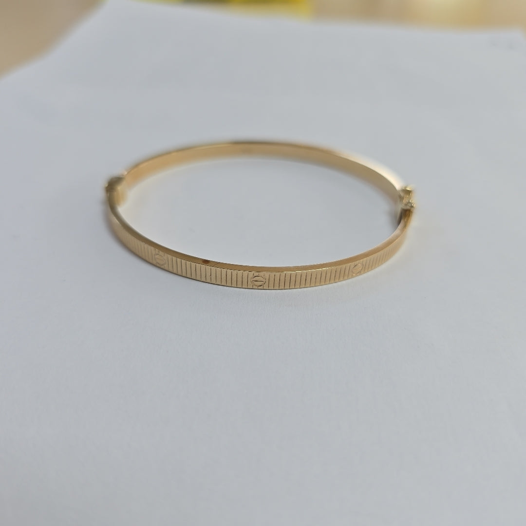 PULSERA RIGIDA ORO 10 K 6.6 GRMS (SEMINUEVO)