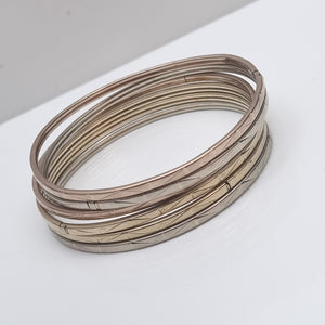 SEMANARIO DE PULSERAS ORO COMBINADO 8 K 21,50 GRMS (SEMINUEVO)