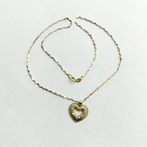 CADENA, DIJE ORO, ORO COMBINADO 10 K 1.3 GRMS (SEMINUEVO)