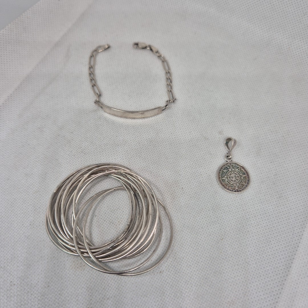 DIJE, ESCLAVA, OTRO PLATA 29.6 GRMS (SEMINUEVO)