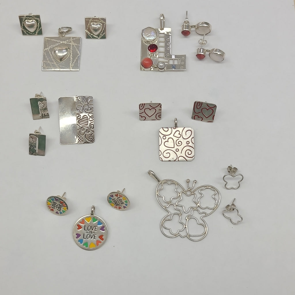 ARETES PAR, DIJE PLATA 45.6 GRMS (SEMINUEVO)