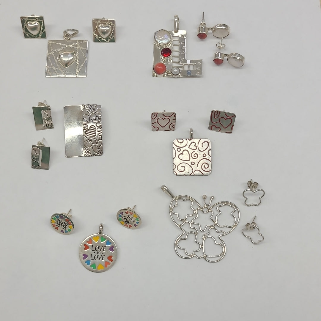 ARETES PAR, DIJE PLATA 45.6 GRMS (SEMINUEVO)