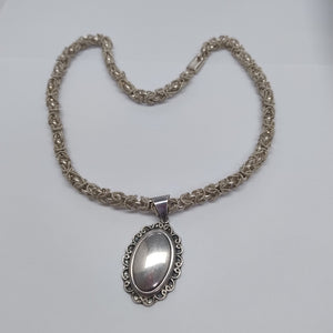 BROQUELES PAR,GARGANTILLA PLATA 125,50 GRMS (SEMINUEVO)