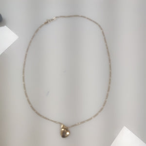CADENA, DIJE ORO 10 K 2.5 GRMS (SEMINUEVO)