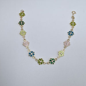 PULSERA ESPECIAL FLORES CON ESMALTE 14K 18 CM 4.8 GR (NUEVO)