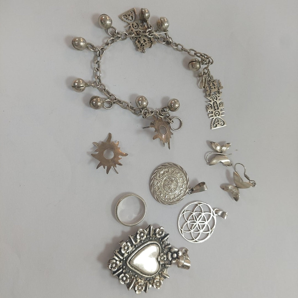 ARETES PAR,DIJE,PULSERA PLATA 65,80 GRMS (SEMINUEVO)