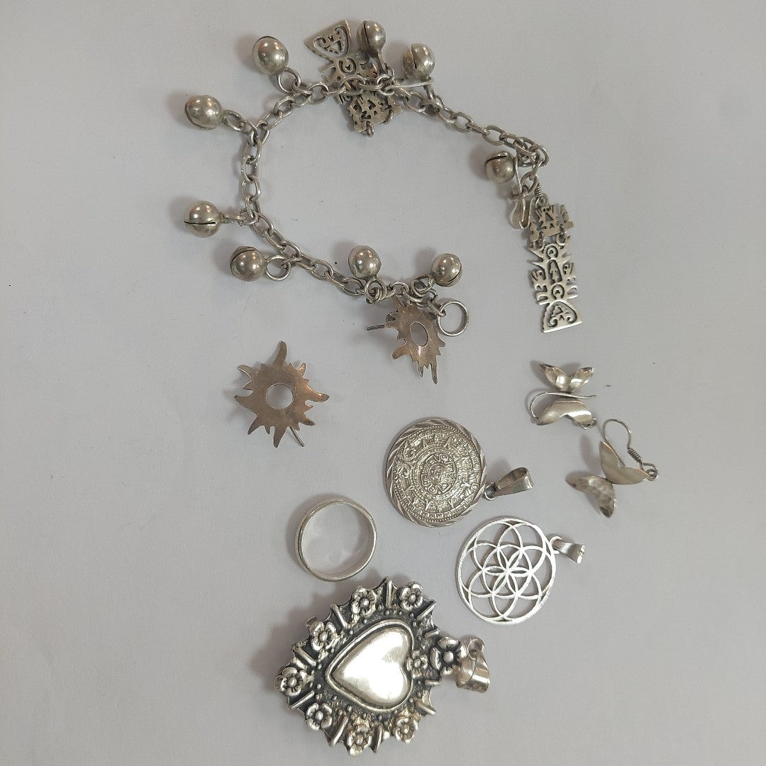 ARETES PAR,DIJE,PULSERA PLATA 65,80 GRMS (SEMINUEVO)