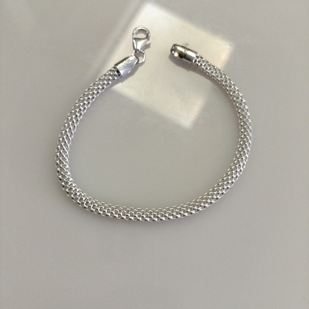 PULSERA TEJIDO ESPECIAL PLATA .925 18 CM 4.9 GR (NUEVO)