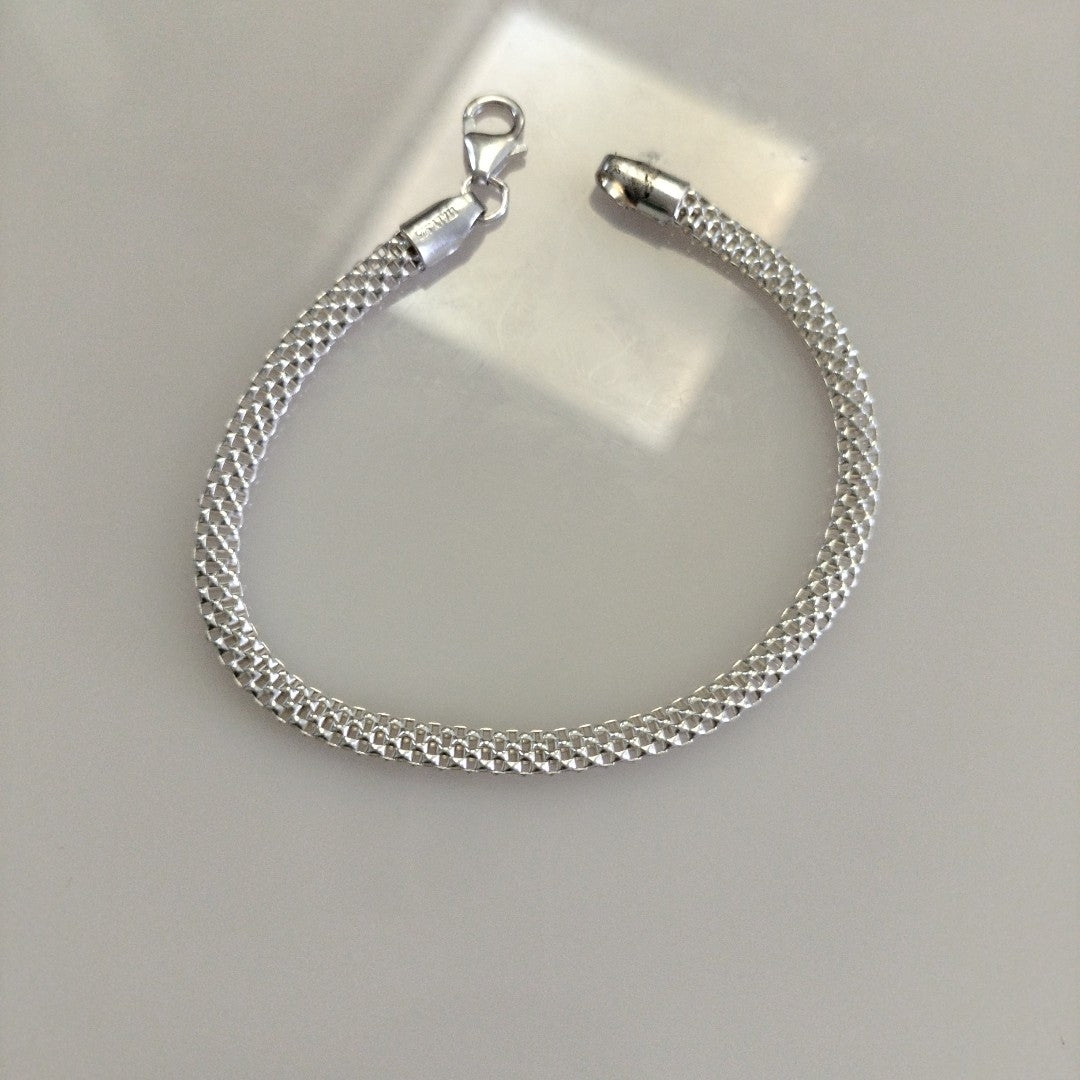 PULSERA TEJIDO ESPECIAL PLATA .925 18 CM 4.9 GR (NUEVO)