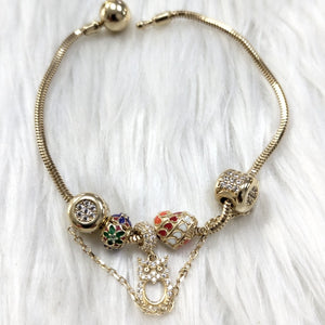 PULSERA CHARM ORO 14K 12 (NUEVO)