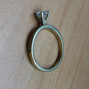 SOLITARIO ORO 14 K 2.8 GRMS (SEMINUEVO)