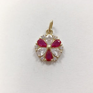 DIJE FLOR CIRCONIAS Y PIEDRAS DE COLOR 14K 2.8 GR (NUEVO)
