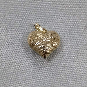 DIJE TEJIDO CORAZON LABRADO 14K 1.1 GR (NUEVO)
