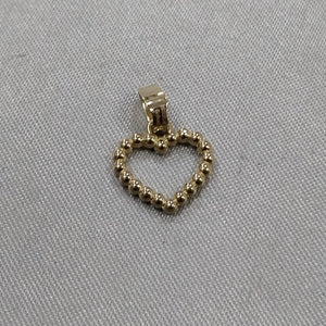 DIJE CORAZON CON CIRCONIAS 10K 0.5 GR (NUEVO)
