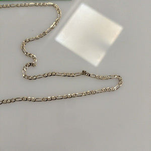 CADENAS TEJIDO FIGARO GUCHI ORO 10K 55 CM 4.9 GR (NUEVO)