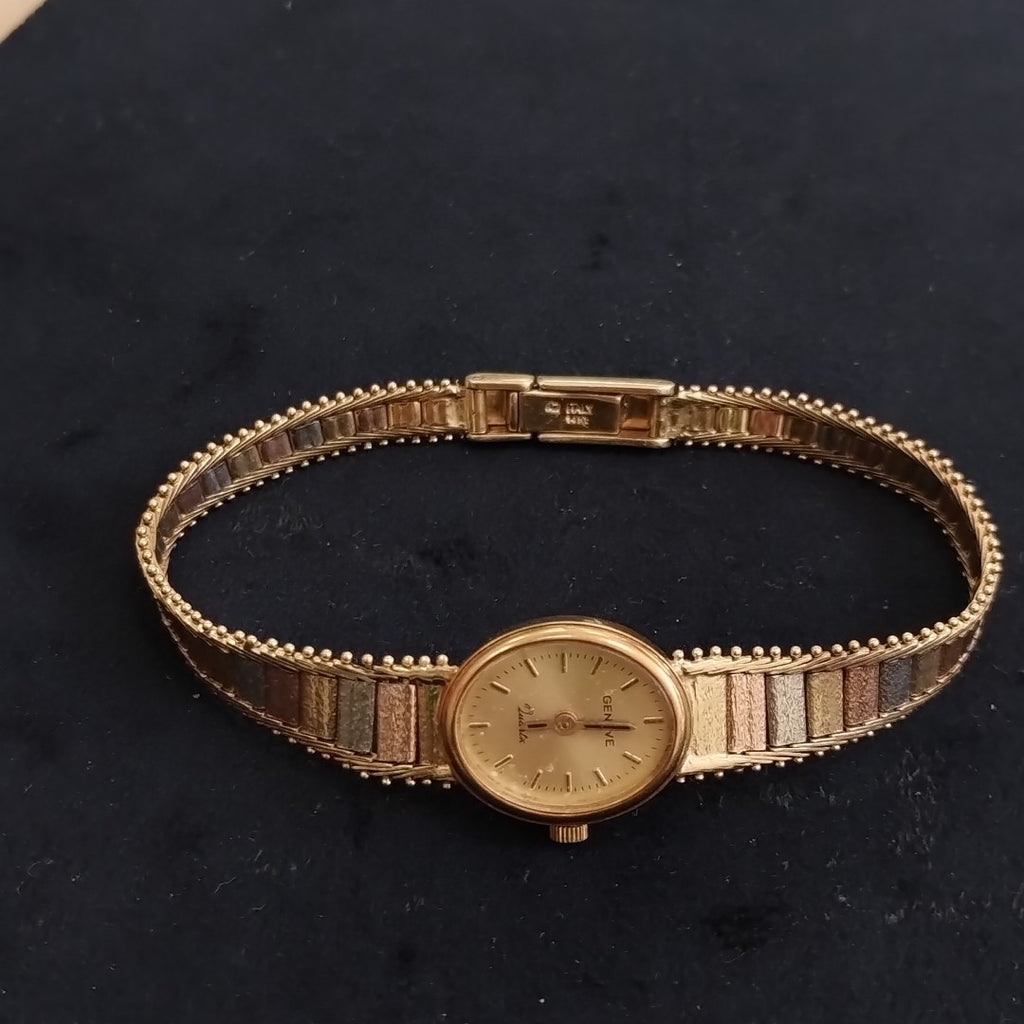 RELOJ CAJA Y PULSO ORO ORO, ORO COMBINADO 14 K 18.7 GRMS (SEMINUEVO)