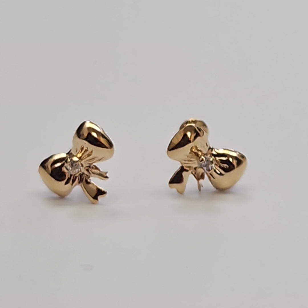 BROQUELES BROQUEL FIG MOÑO C CIRCONIA 14K 0.2441 GR (NUEVO)