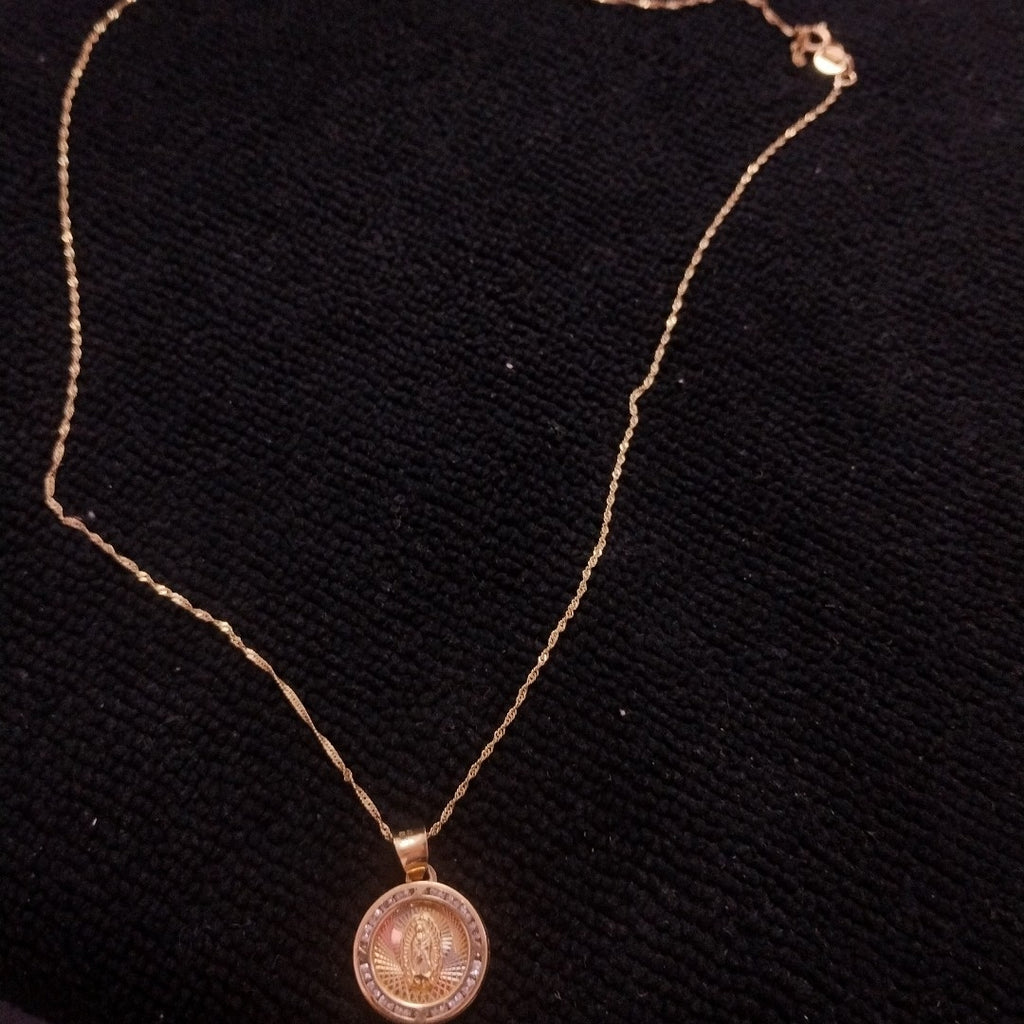 CADENA, MEDALLA RELIGIOSA ORO 10 K 1.9 GRMS (SEMINUEVO)