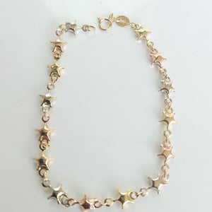 PULSERA TEJIDO ESPECIAL ESTRELLAS COMBINADAS 14K 18 CM 2.3 GR (NUEVO)