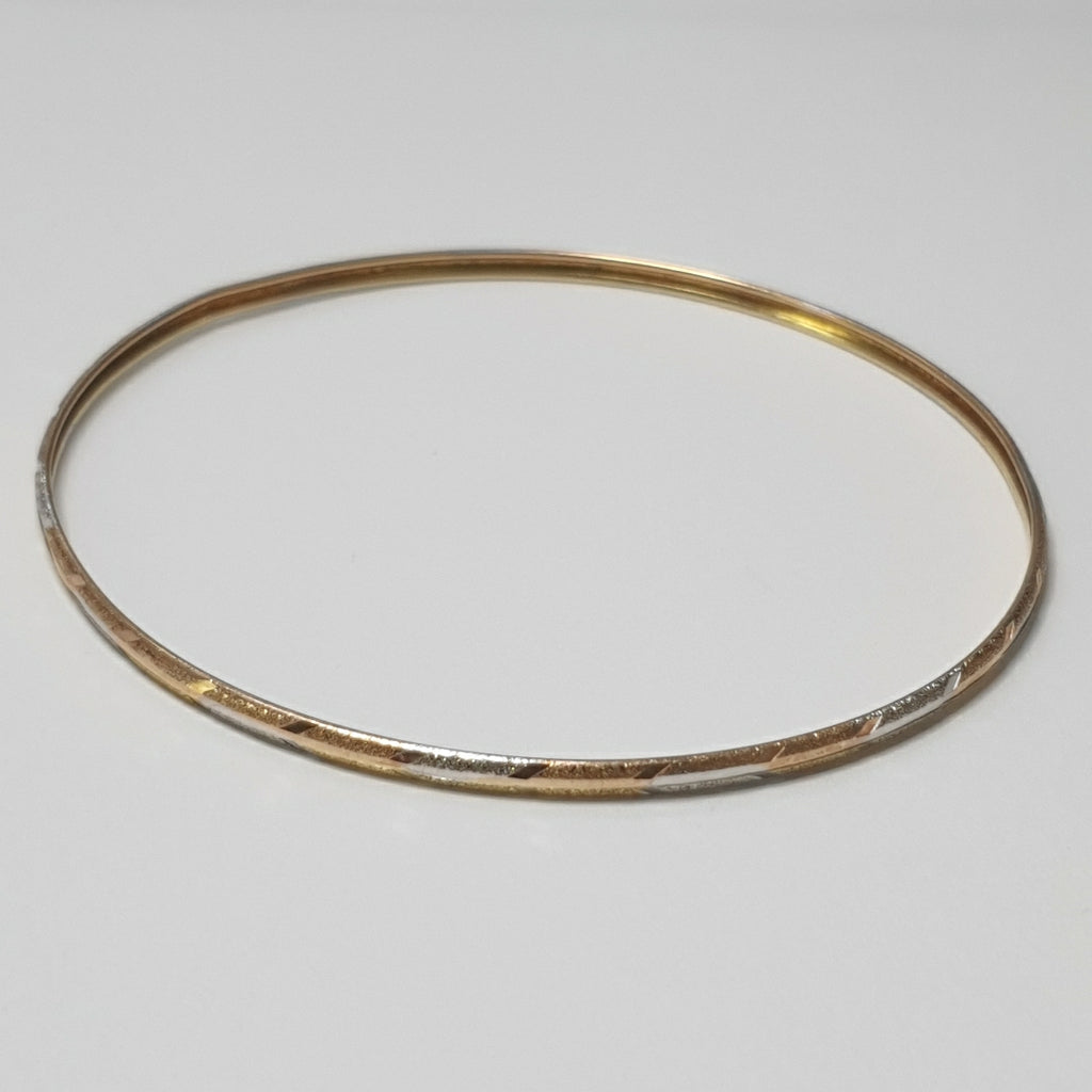 PULSERA RIGIDA ORO COMBINADO 10 K 3,30 GRMS (SEMINUEVO)