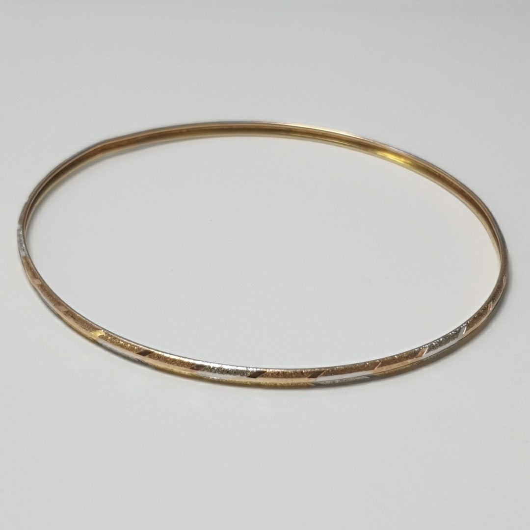 PULSERA RIGIDA ORO COMBINADO 10 K 3,30 GRMS (SEMINUEVO)