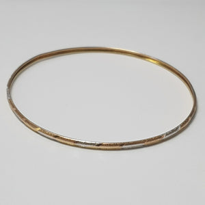 PULSERA RIGIDA ORO COMBINADO 10 K 3,30 GRMS (SEMINUEVO)