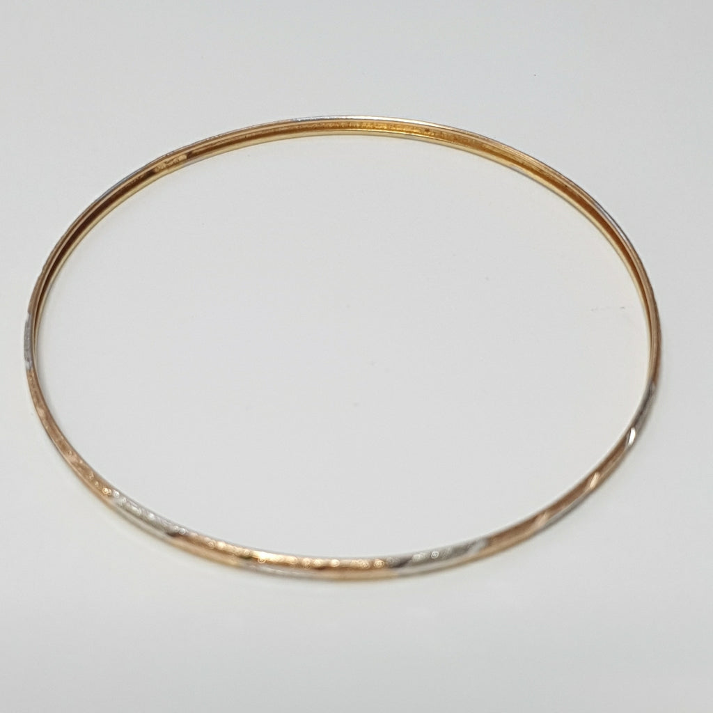 PULSERA RIGIDA ORO COMBINADO 10 K 3,30 GRMS (SEMINUEVO)