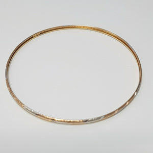 PULSERA RIGIDA ORO COMBINADO 10 K 3,30 GRMS (SEMINUEVO)