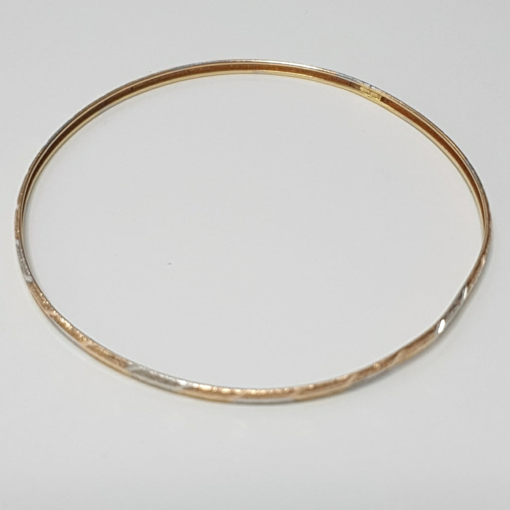 PULSERA RIGIDA ORO COMBINADO 10 K 3,20 GRMS (SEMINUEVO)