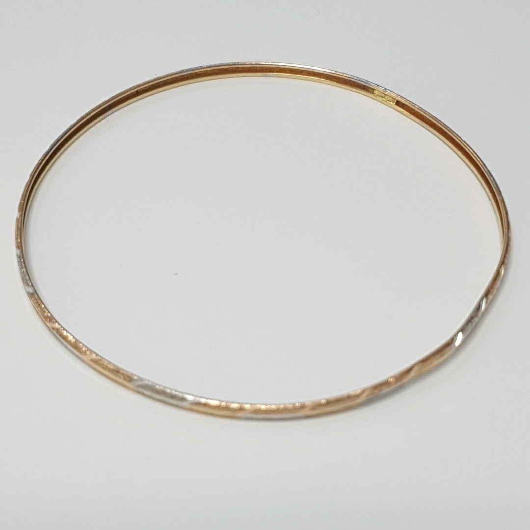 PULSERA RIGIDA ORO COMBINADO 10 K 3,20 GRMS (SEMINUEVO)