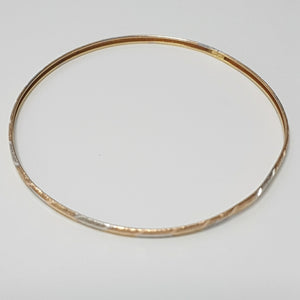 PULSERA RIGIDA ORO COMBINADO 10 K 3,20 GRMS (SEMINUEVO)