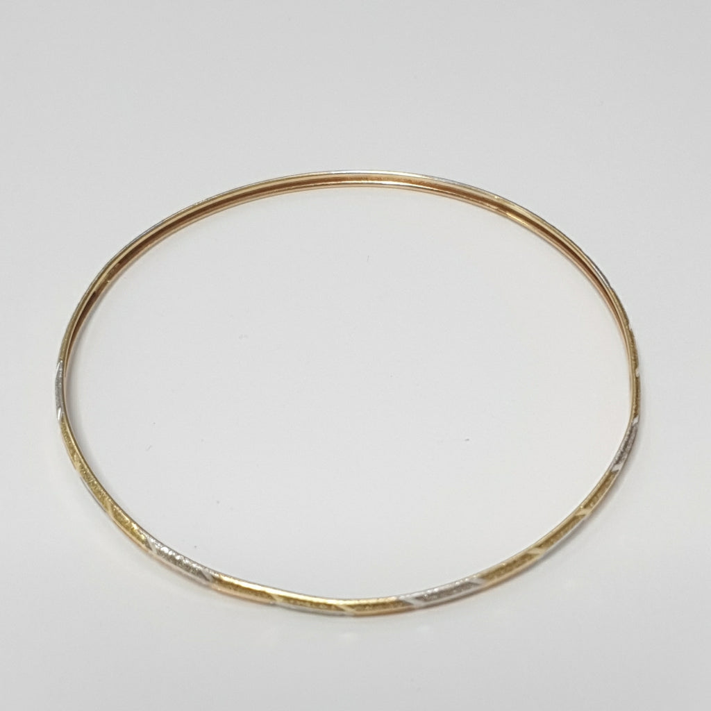 PULSERA RIGIDA ORO COMBINADO 10 K 3,40 GRMS (SEMINUEVO)