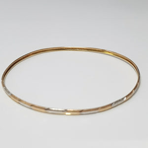PULSERA RIGIDA ORO COMBINADO 10 K 3,10 GRMS (SEMINUEVO)