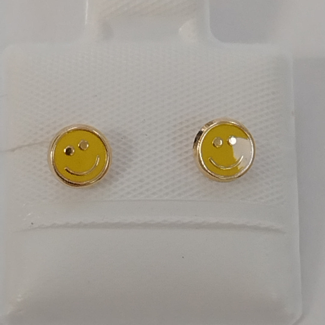 BROQUELES BROQUEL FIG SONRISA ESMALTE AMARILLO 14K 0.2074 GR (NUEVO)