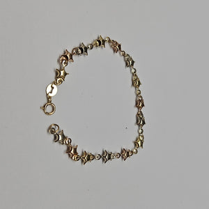 PULSERA TEJIDO ESPECIAL ESTRELLAS COMBINADAS 14K 18 CM 2.3 GR (NUEVO)
