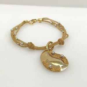 PULSERA ORO COMBINADO 14 K 7,00 GRMS (SEMINUEVO)