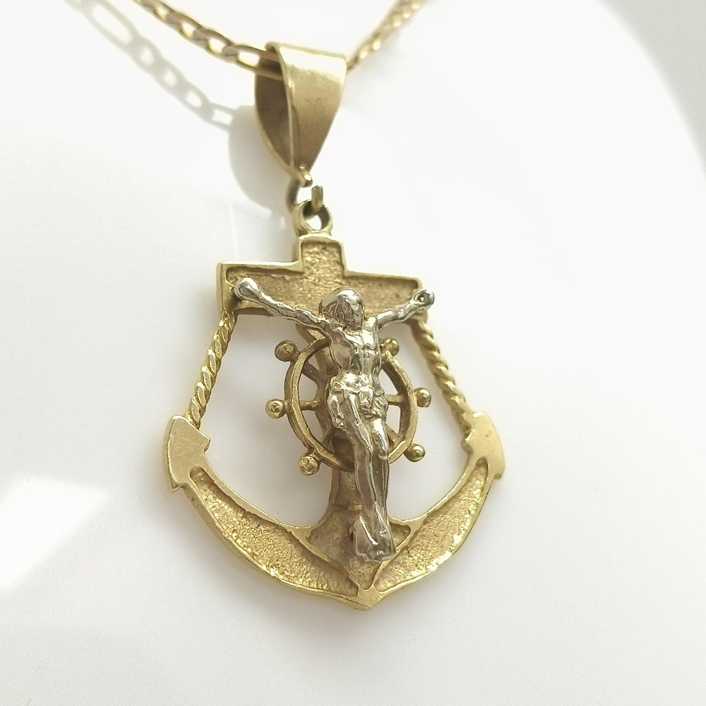 CRISTO EN ANCLA ORO 14 K 6.7 GRMS (SEMINUEVO)
