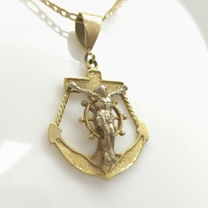 CRISTO EN ANCLA ORO 14 K 6.7 GRMS (SEMINUEVO)