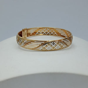 PULSERA RIGIDA ORO COMBINADO 10 K 8,20 GRMS (SEMINUEVO)
