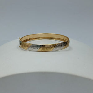 PULSERA RIGIDA ORO,RODIADO 10 K 5,90 GRMS (SEMINUEVO)
