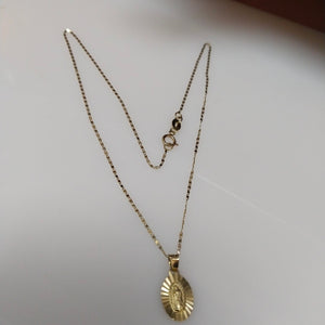 CADENA,MEDALLA RELIGIOSA ORO 10 K 1,20 GRMS (SEMINUEVO)