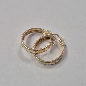ARETES ARRACADAS LABRADAS 10K 2.4 GR (NUEVO)