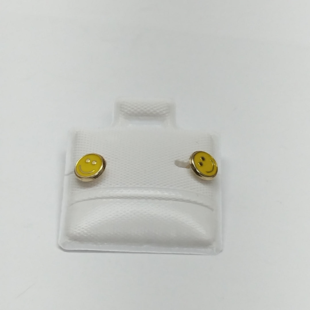 BROQUELES BROQUEL FIG SONRISA ESMALTE AMARILLO 14K 0.2074 GR (NUEVO)