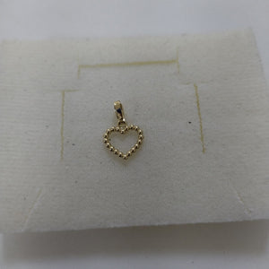 DIJE CORAZON CON CIRCONIAS 10K 0.6 GR (NUEVO)