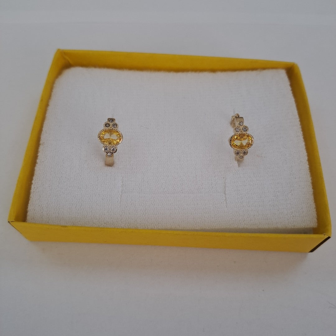 ARETES ARRACADAS CON CIRCONIAS Y PDRAS COL 14K 3.2 GR (NUEVO)