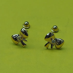 BROQUELES BROQUEL FIG MOÑO C CIRCONIA 14K 0.2441 GR (NUEVO)