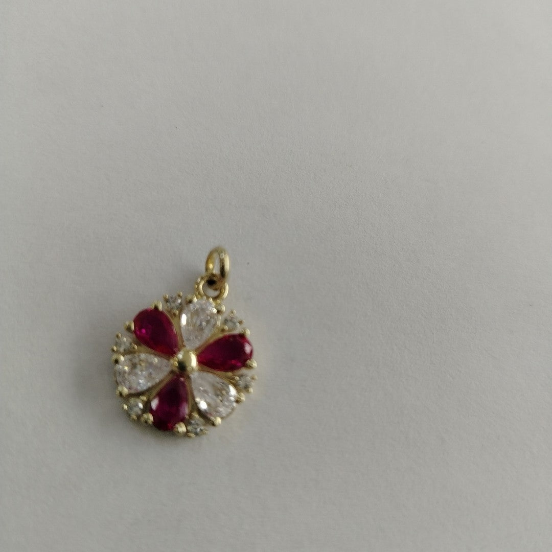 DIJE FLOR CIRCONIAS Y PIEDRAS DE COLOR 14K 2.8 GR (NUEVO)